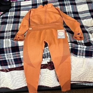 Vibrant Orange Leggings And Jacket Cropped With Thumb Holes NWT